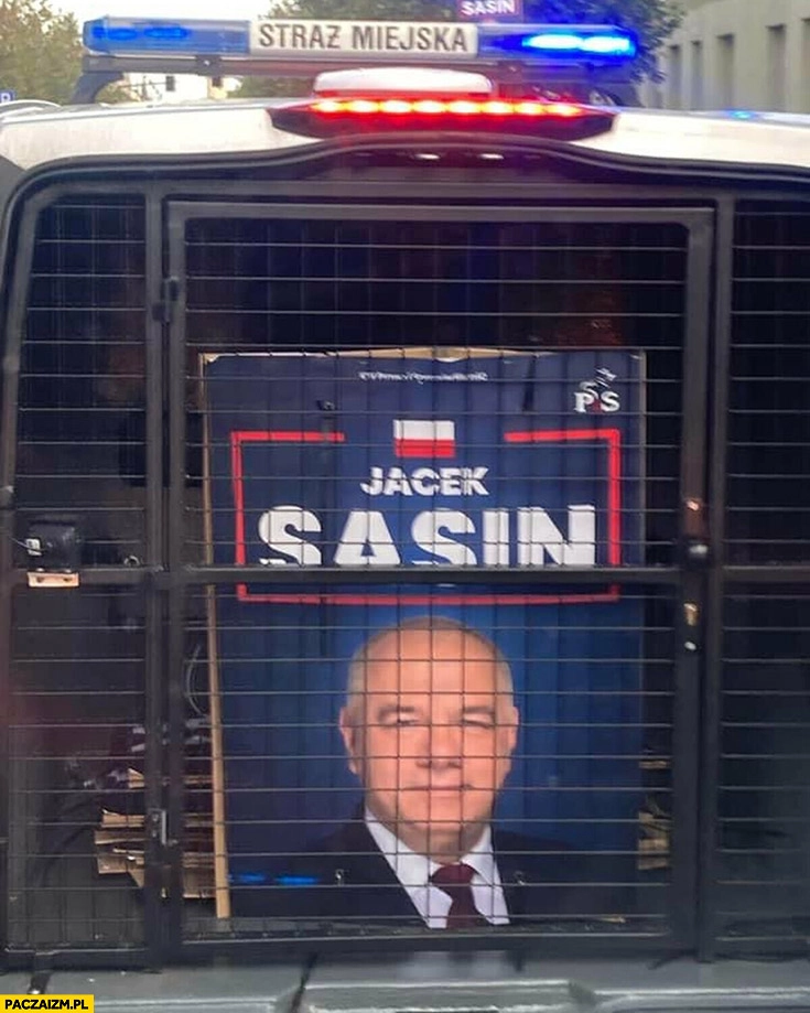
    Jacek Sasin za kratami aresztowany plakat transparent straż miejska