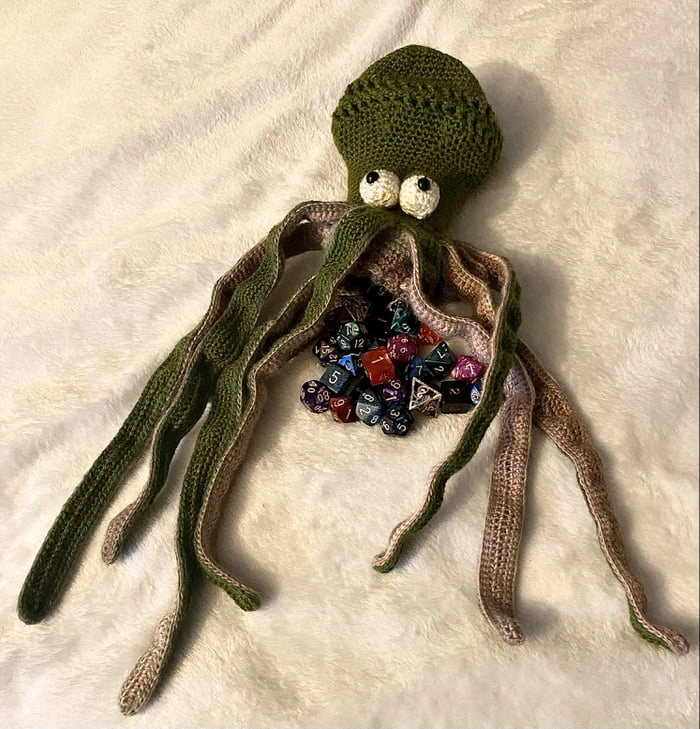 
    My GF is a doctor who is way out of my league. She took 60 hours of her precious time to Crochet me this Kraken which is a pouch for my geek ass DnD dices. She is a 9Gagger let her see it.