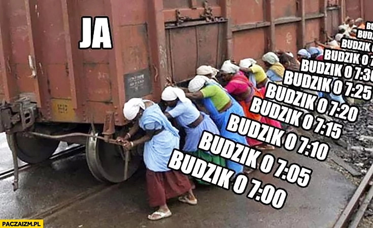 
    Ja budziki kobiety próbują przesunąć ruszyć wagon pociągu